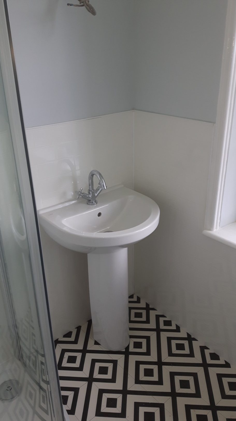 The wall boards are solid panel sections made to simulate tiles but are very easy to keep clean. The wall boards are solid panel sections made to simulate tiles but are very easy to keep clean.
